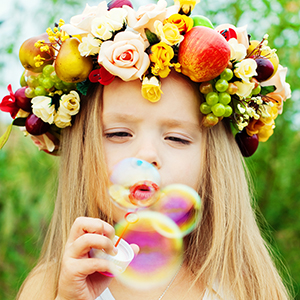 Girl blowing bubbles